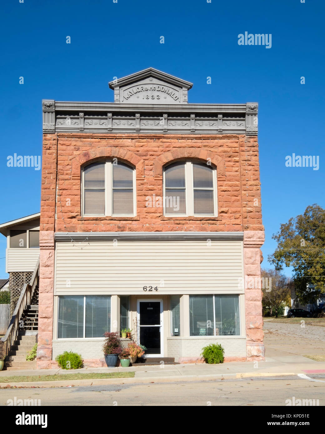 Kaylor McDonald & building, circa 1893, costruite di rosso di arenaria nativo, 624 e Oklahoma Ave., Guthrie, Oklahoma, Stati Uniti d'America. Guthrie quartiere storico. Foto Stock