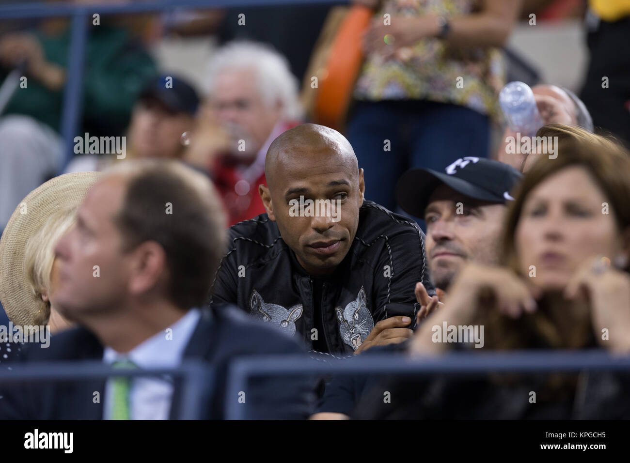 FLUSHING NY- 04 settembre: Thierry Henry, il giorno undici del 2014 US Open al USTA Billie Jean King National Tennis Center il 4 settembre 2014 nel quartiere di lavaggio del Queens borough di New York City. Persone: Thierry Henry Foto Stock