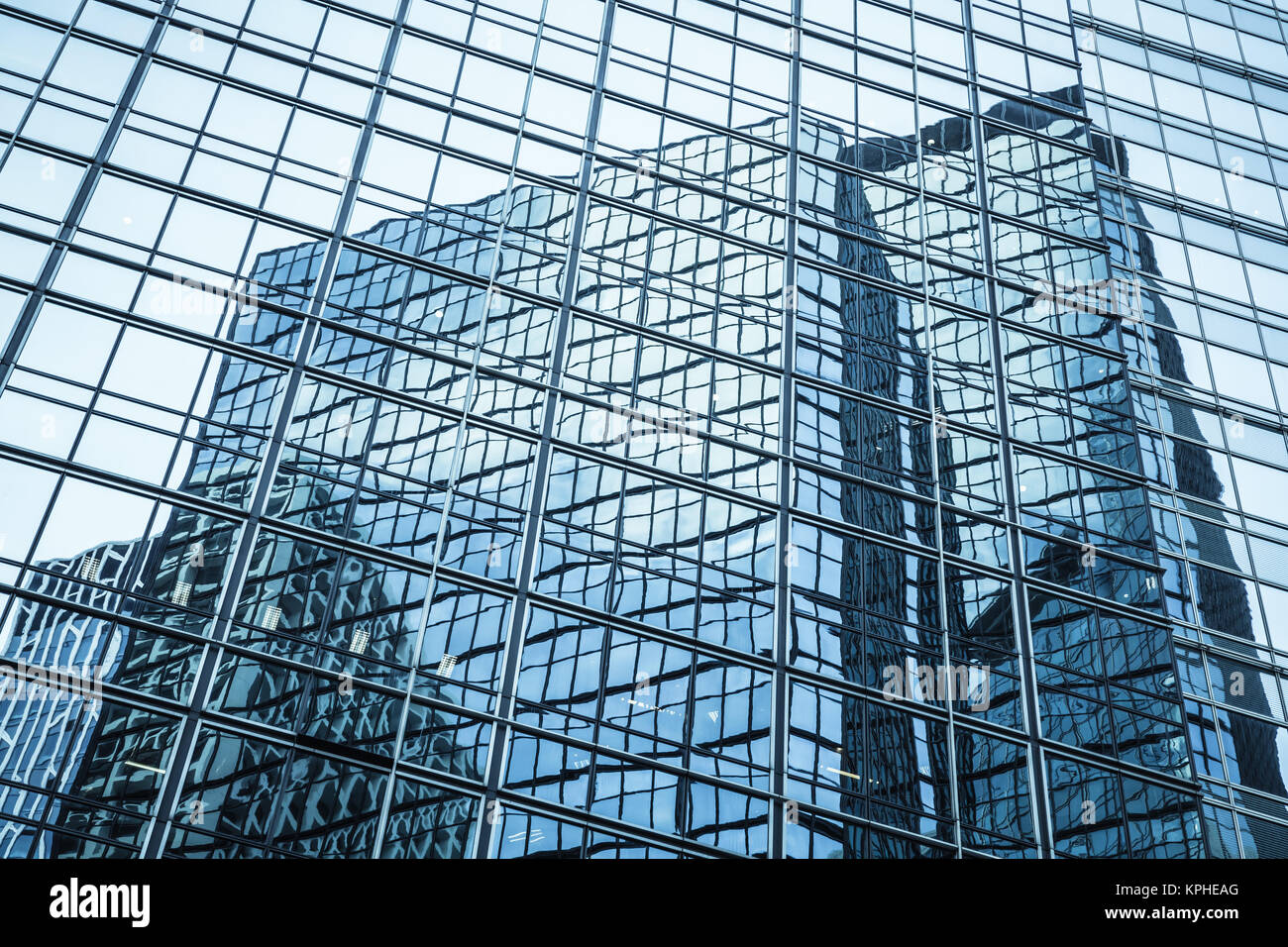 Abstract foto di sfondo di architettura moderna. Grattacielo parete in vetro e acciaio di riflessione Foto Stock