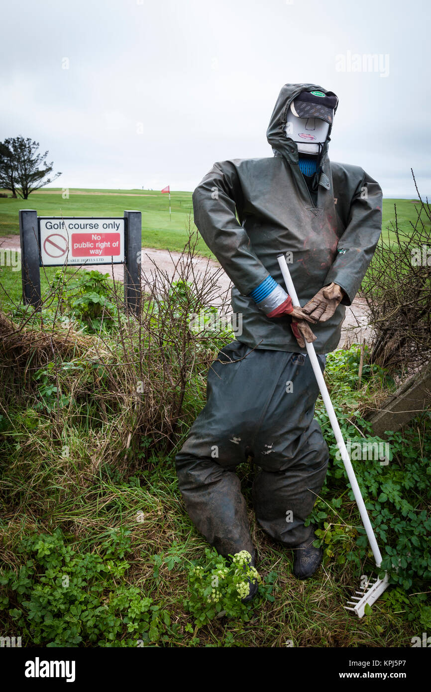 Divertimento manichino vestito come un giocatore di golf. Foto Stock