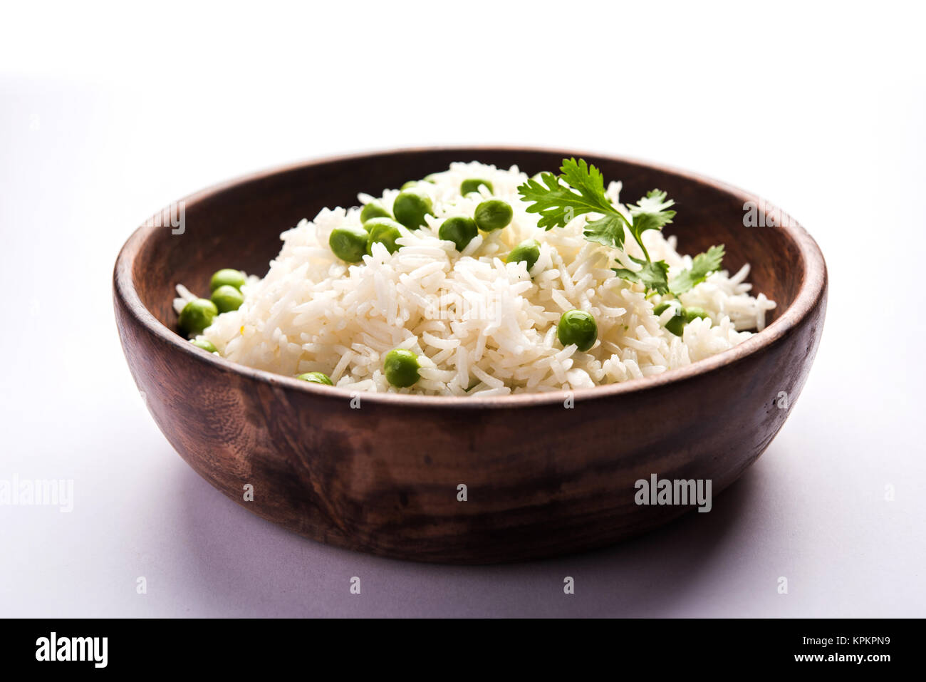 Il riso Basmati o Pilaf pulav con piselli, o riso vegetale utilizzando piselli verdi noto anche come mataró pulav, servita con la pianura dal Foto Stock