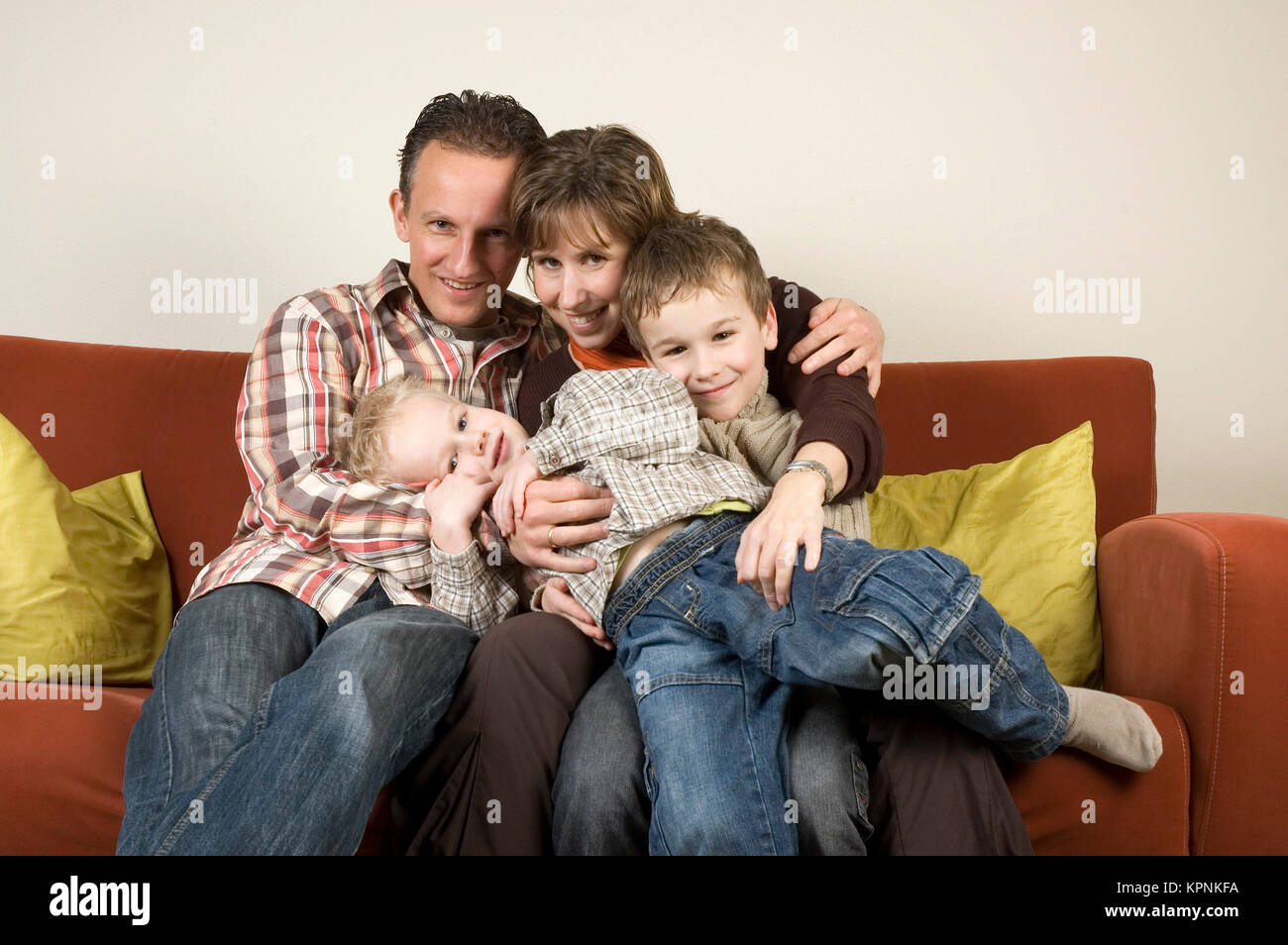 Famiglia su di un lettino 3 Foto Stock