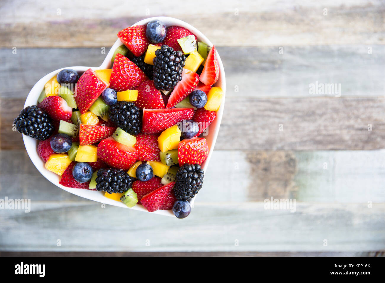 Una sana insalata di frutta Foto Stock