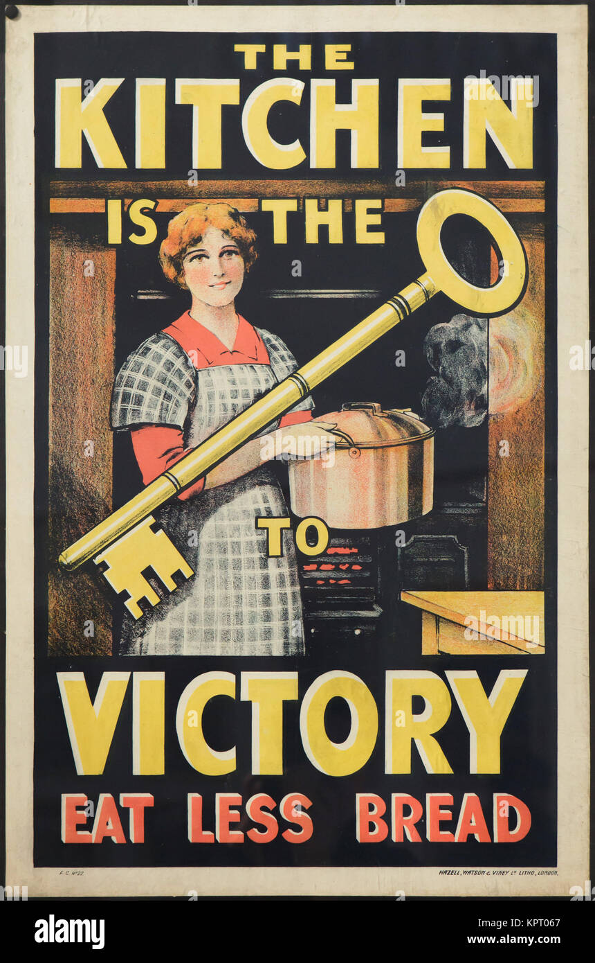 La cucina è la chiave per la vittoria. Mangiare meno pane. Poster da 1914-1918 da uno sconosciuto American Illustrator sul display all'esposizione di poster e nel South Bohemian Gallery (Alšova jihočeská galerie) in Hluboká nad Vltavou in Boemia del Sud, Repubblica Ceca. La mostra dedicata al poster del tempo della prima guerra mondiale viene eseguito fino al 1 ottobre 2017. Foto Stock