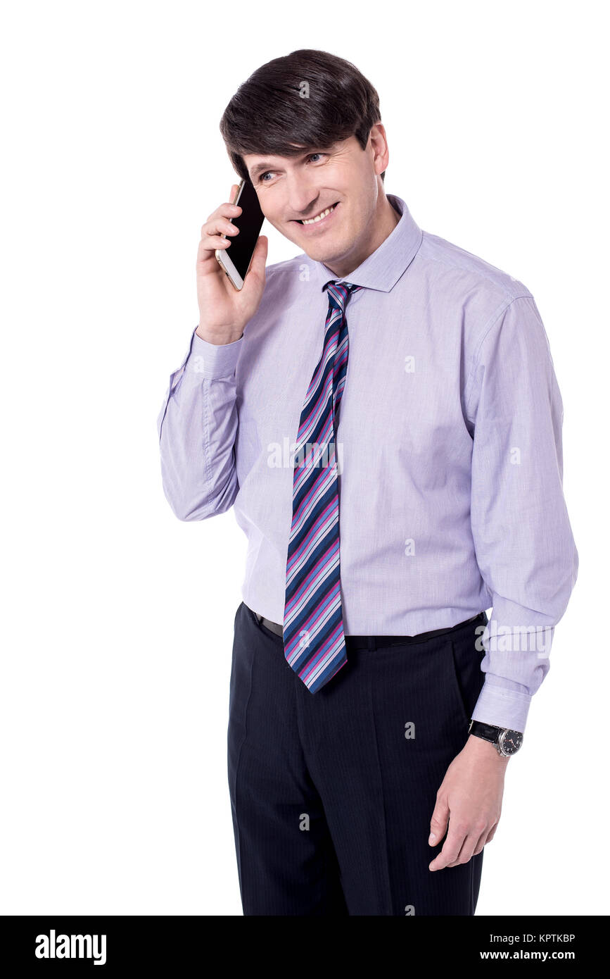 Imprenditore parlando al telefono intelligente. Foto Stock