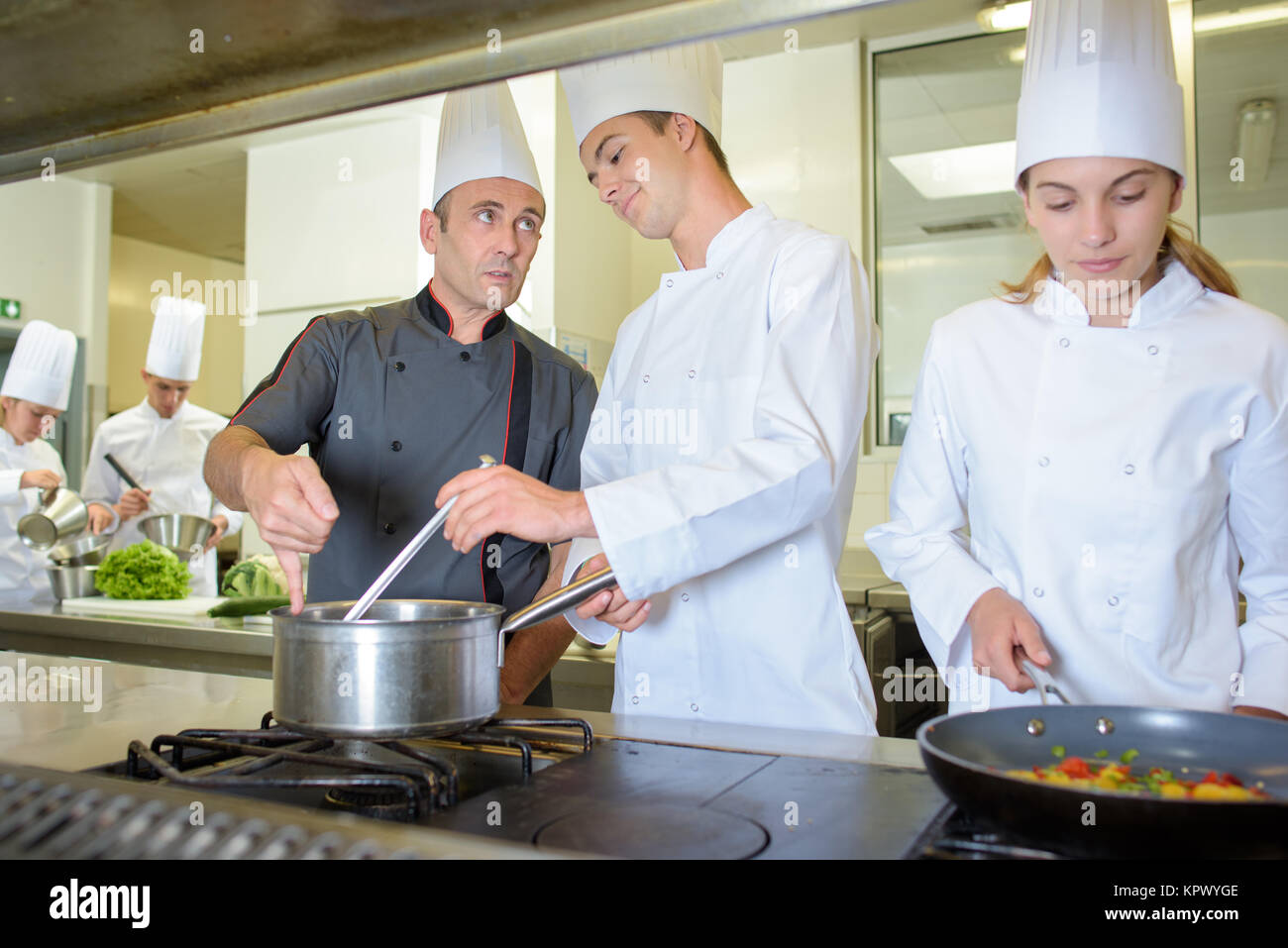 Chef di cucina consulenza studente Foto Stock