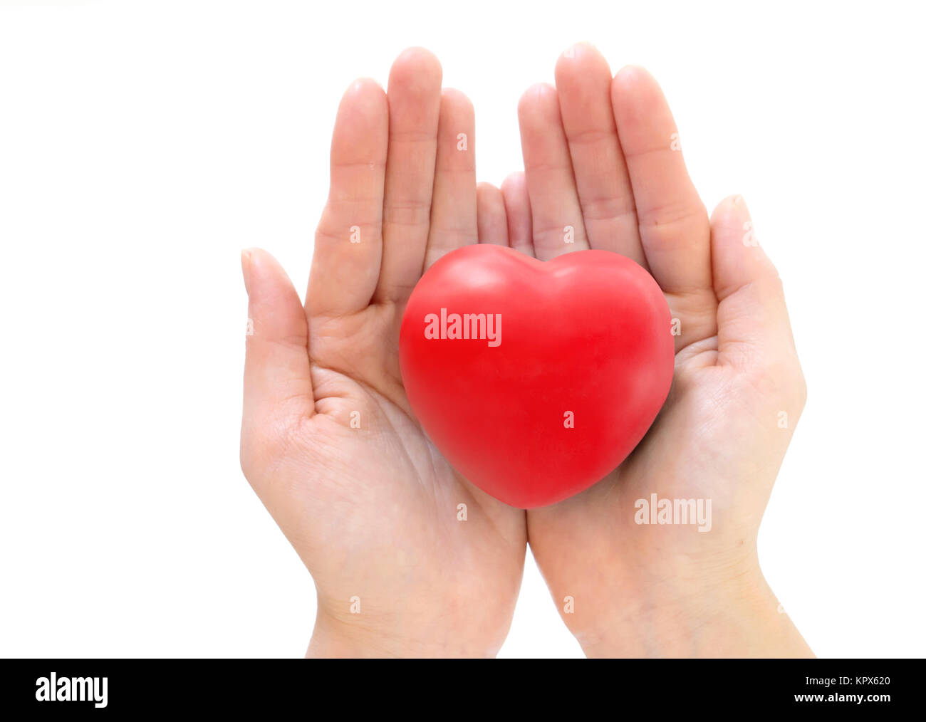 Cuore nelle mani Foto Stock