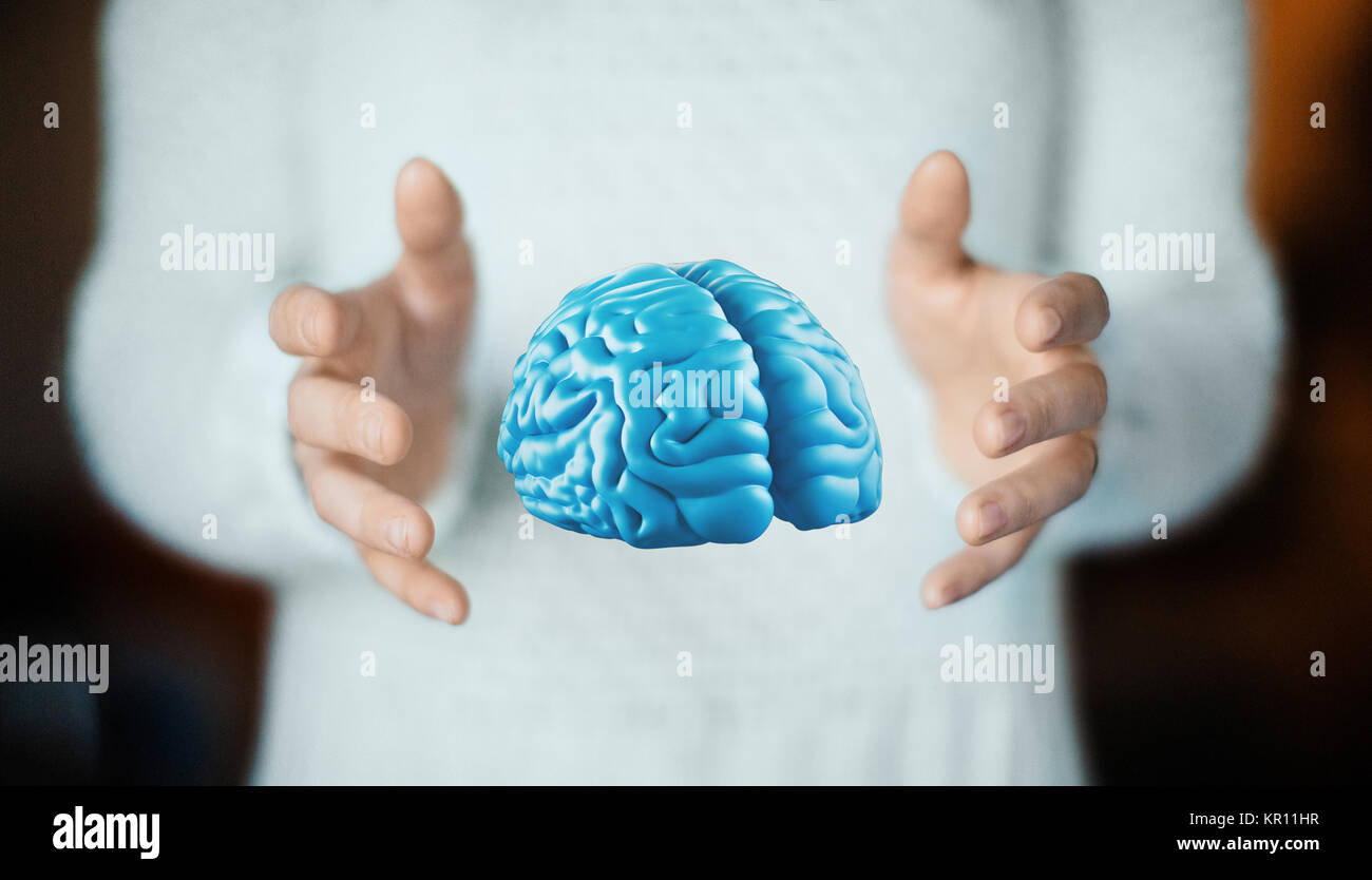 Cervello umano a portata di mano, pensare, tumore, idee Foto Stock