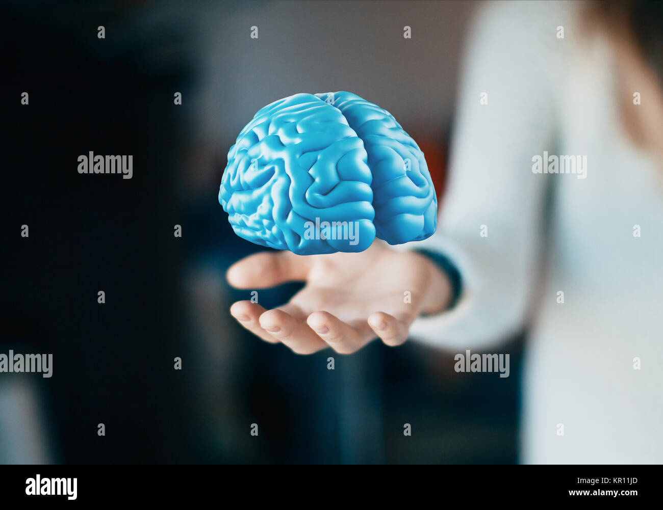 Cervello umano a portata di mano, pensare, tumore, idee Foto Stock