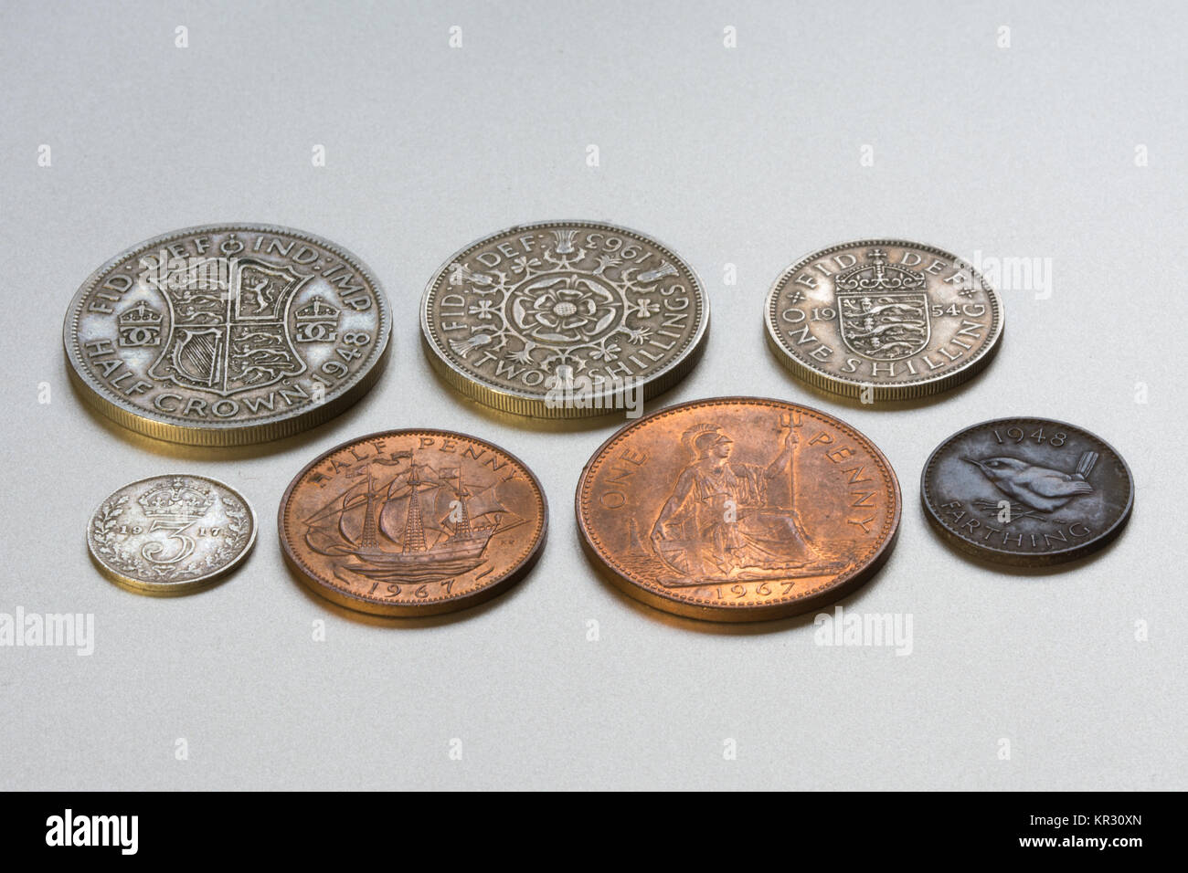 Raccolta di pre-monete decimali Foto Stock