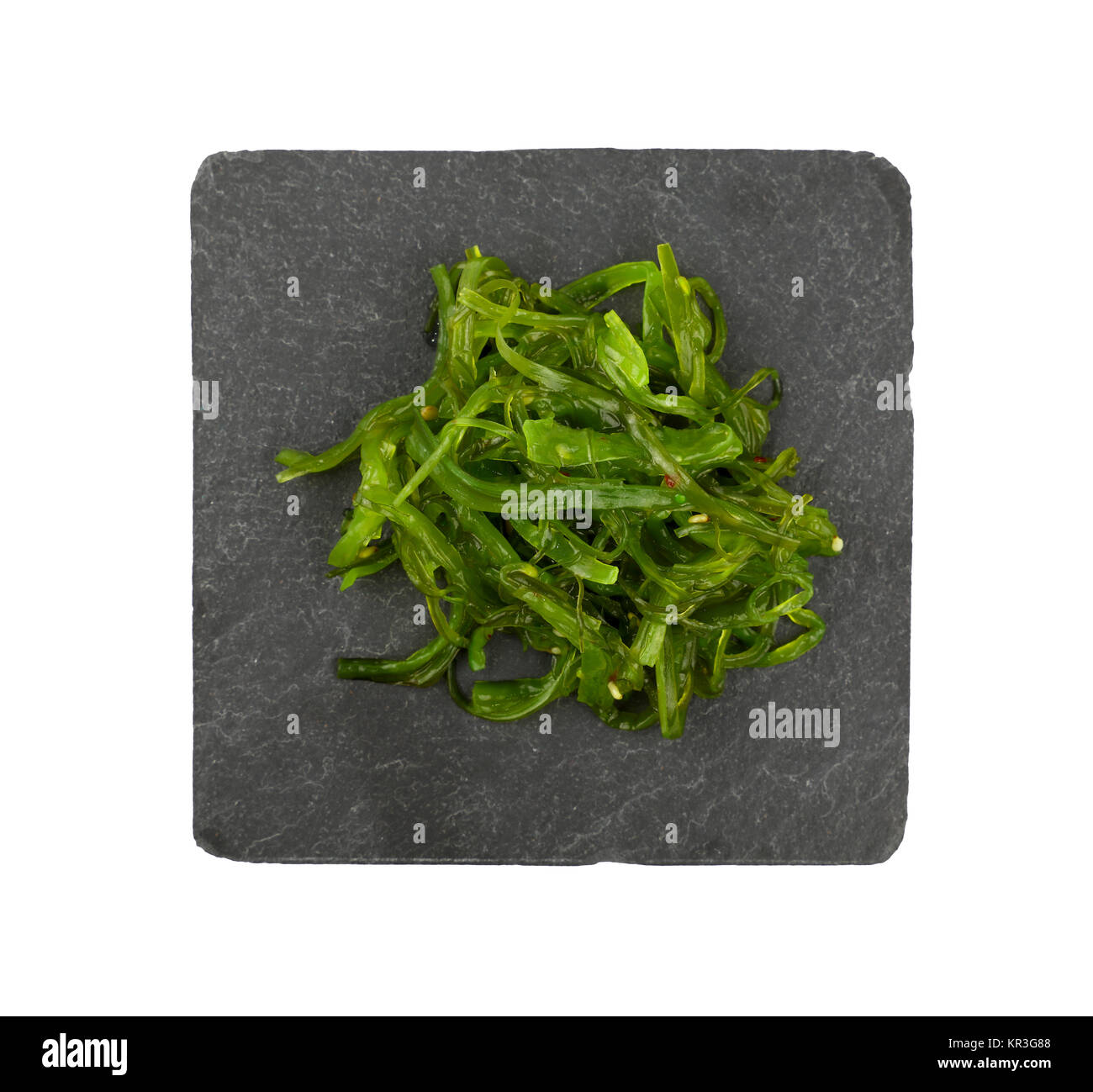Vicino la porzione di verde alghe wakame salad Foto Stock