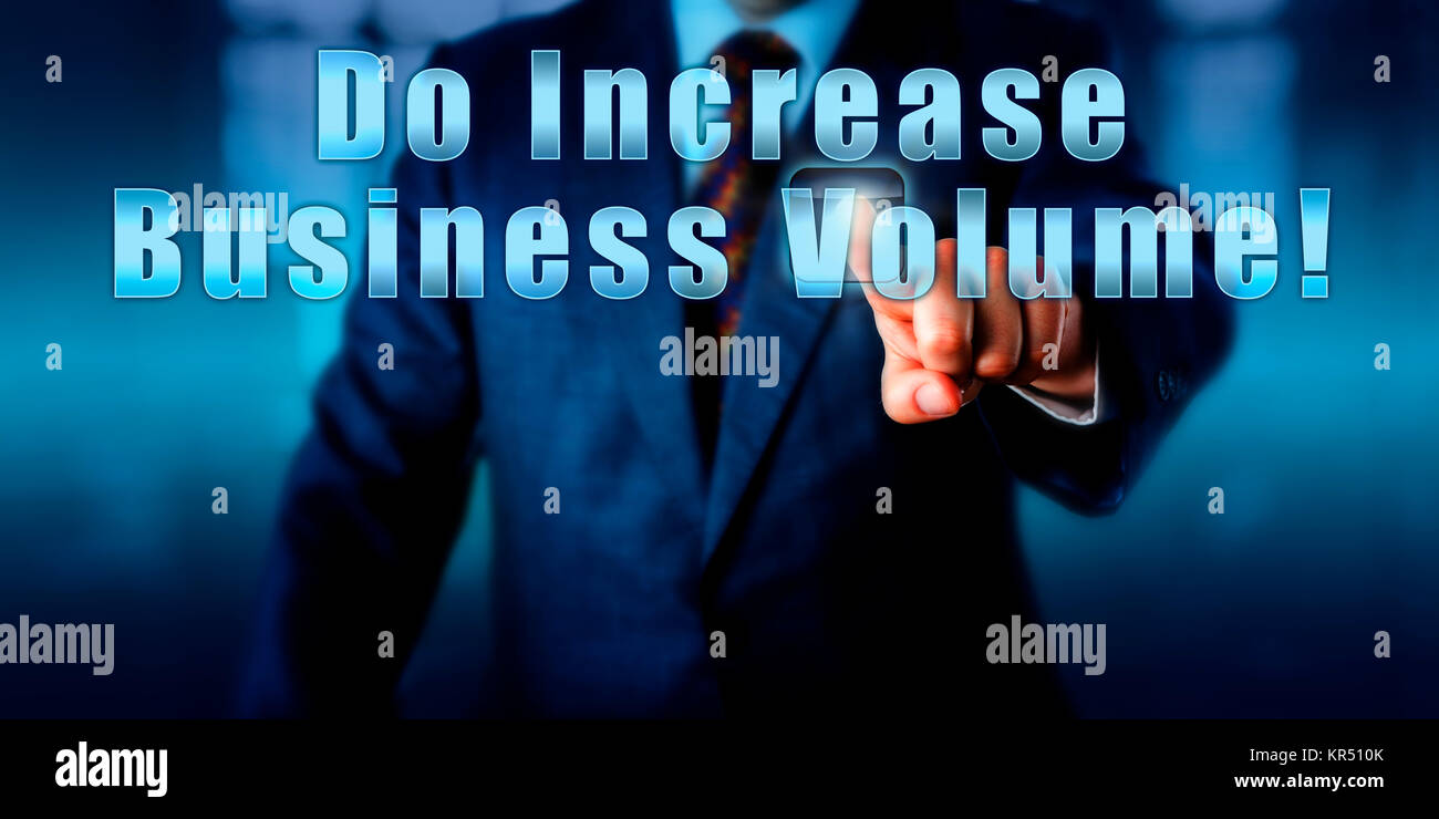 Imprenditore premendo fare aumentare il volume di affari! Foto Stock