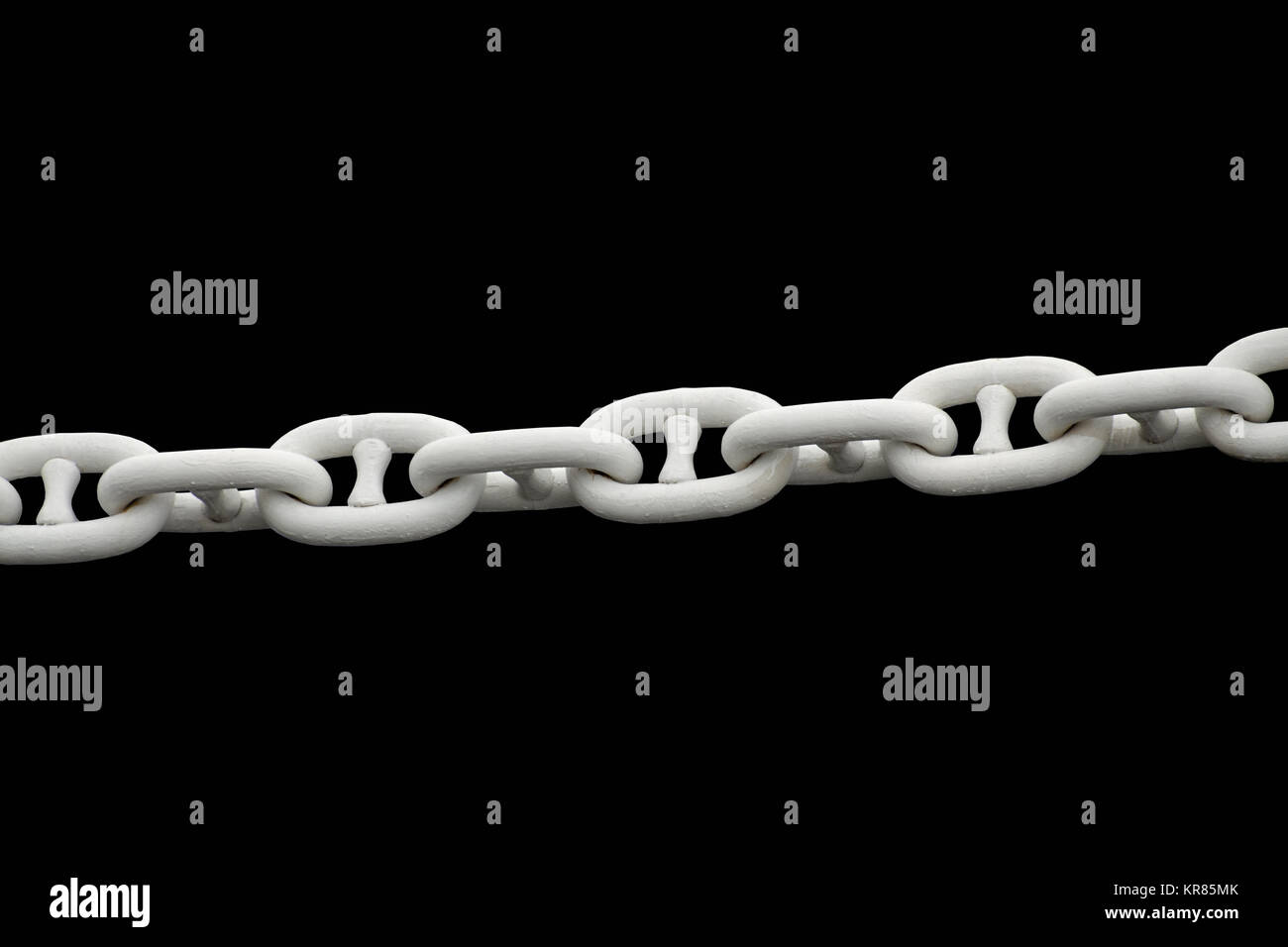 Catena di bianco su uno sfondo nero.maglie di catena unite insieme. Foto Stock