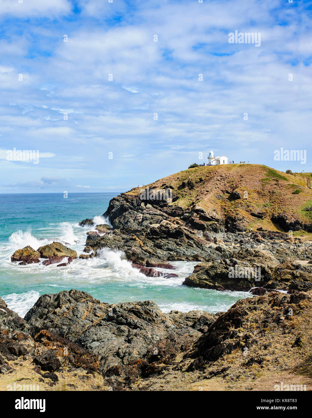 Australia, Nuovo Galles del Sud, Cliff e il faro in background Foto Stock