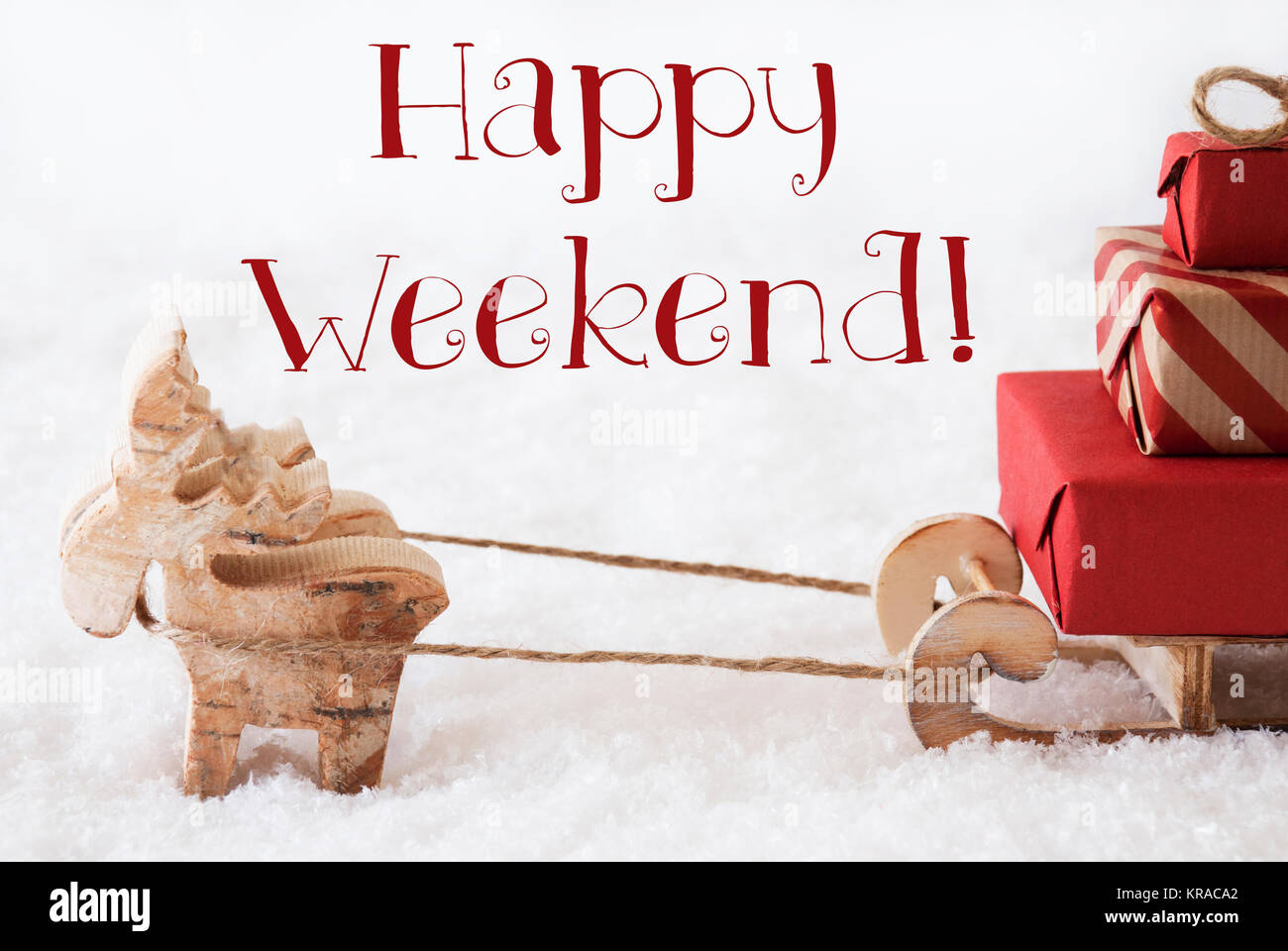 Alce è il disegno di una slitta con Red doni o presenta in neve. Scheda di Natale per i migliori auguri di Buon Natale. Testo inglese Happy Weekend Foto Stock