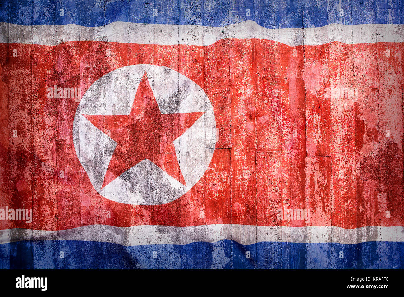 Stile grunge della Corea del Nord bandiera su un muro di mattoni per lo sfondo Foto Stock