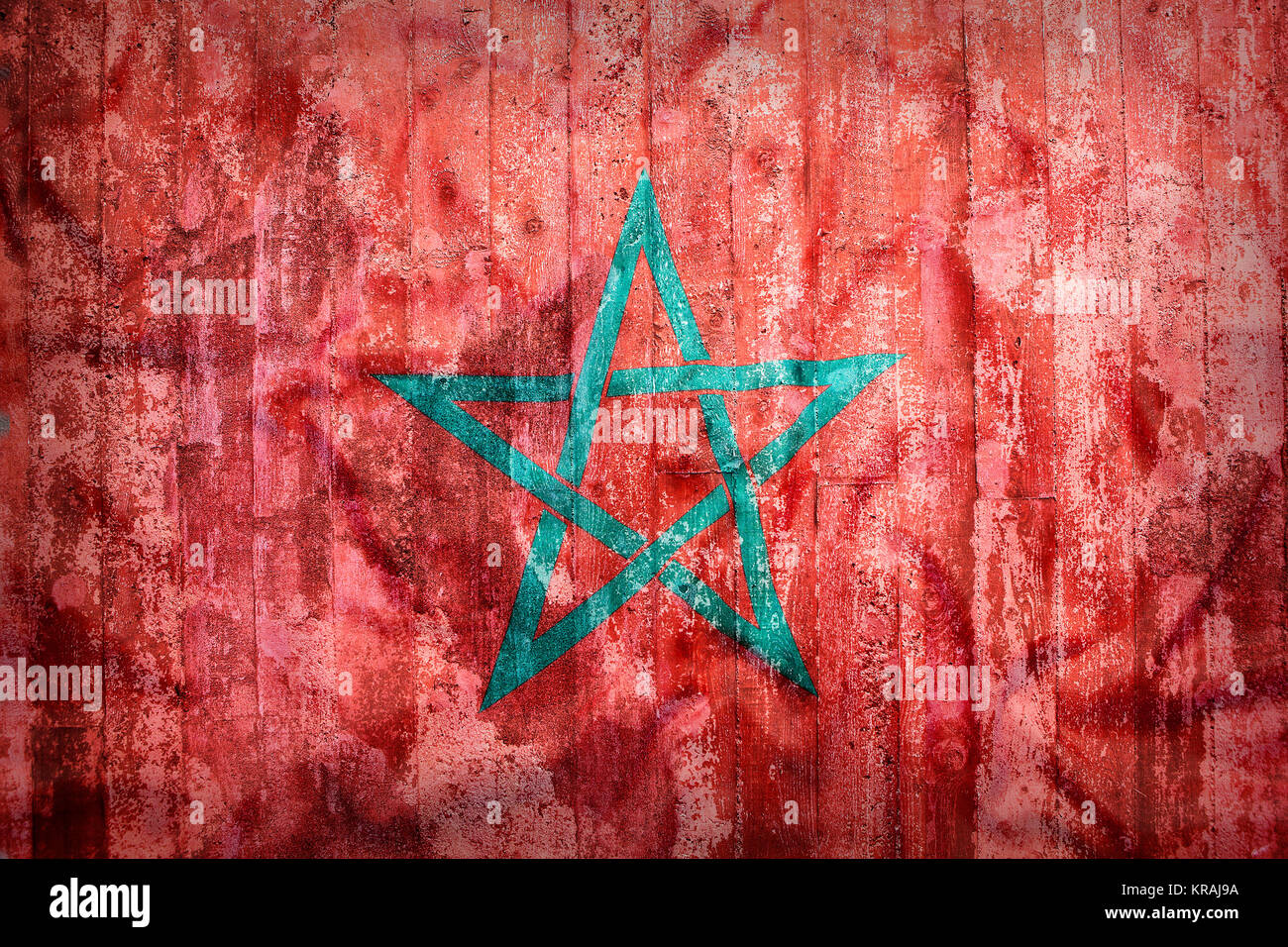 Stile grunge di bandiera del Marocco su un muro di mattoni per lo sfondo Foto Stock