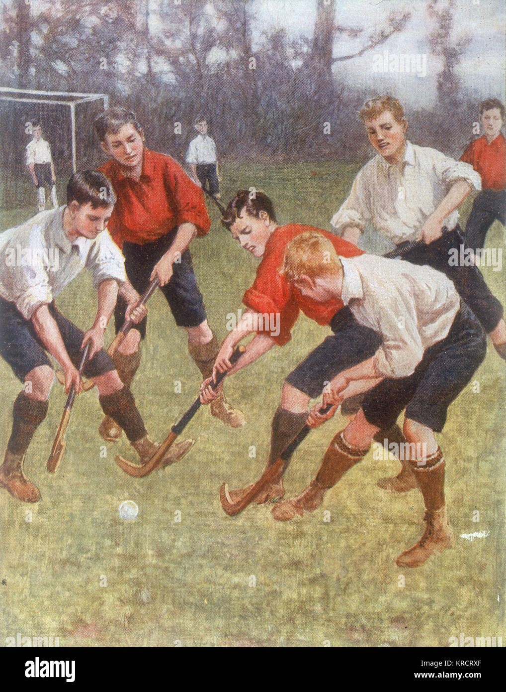 Un ragazzo gioco di hockey data: 1908 Foto Stock