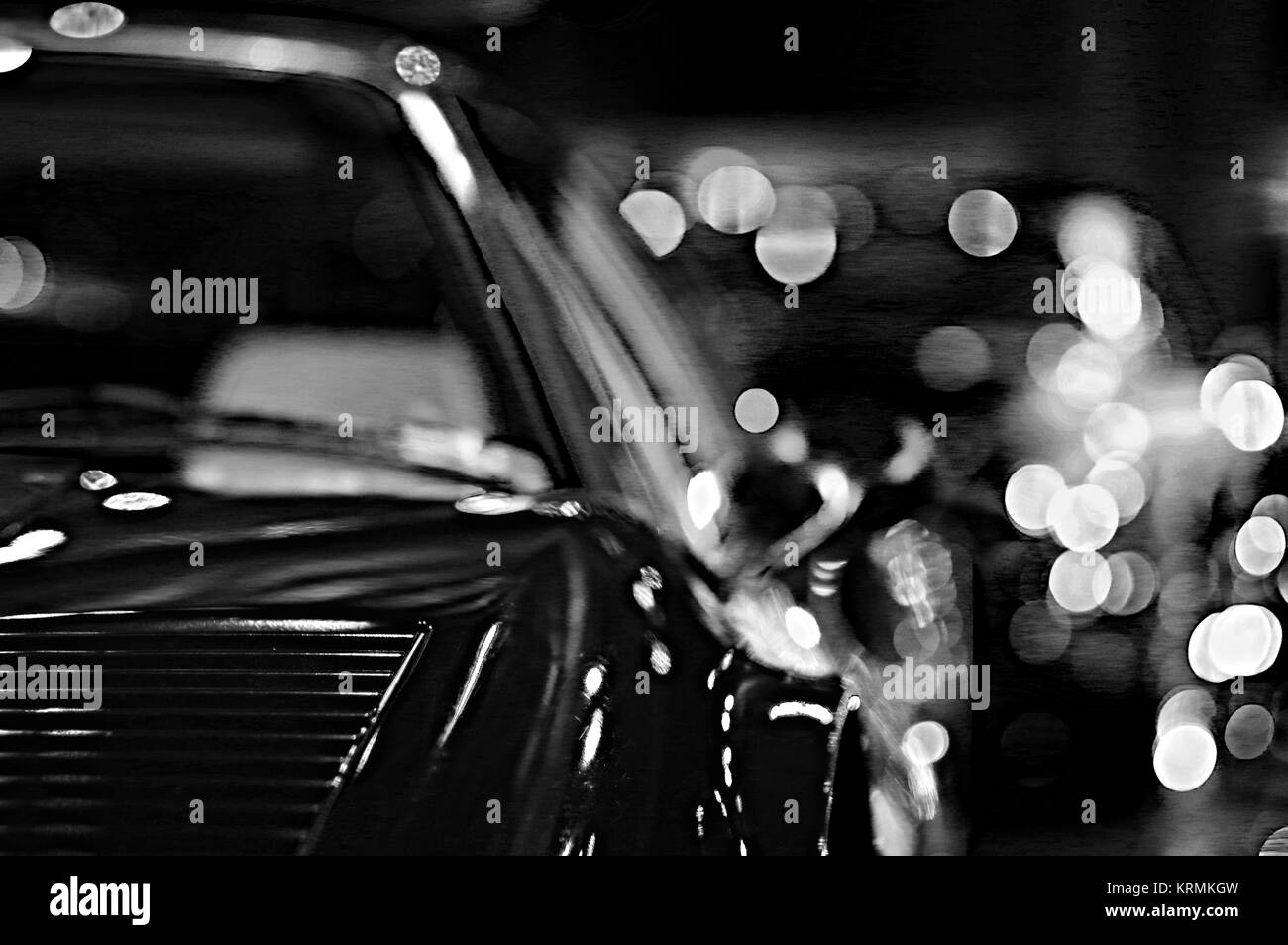 Ferrari 308 Classic Auto sportiva in bianco e nero con immagini sfocate, punto luce sfondo, Auto PARZIALE, RUOTA Hump Foto Stock
