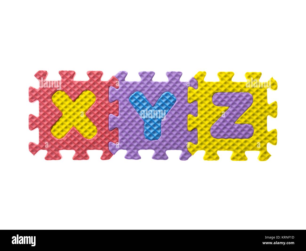 Puzzle di schiuma con alfabeti xy e z Foto Stock
