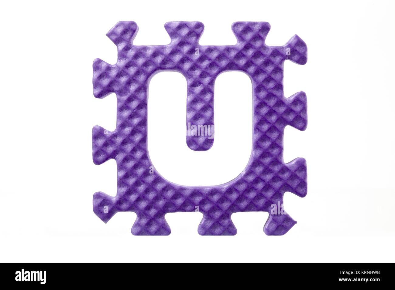 Alfabeto in gomma puzzle su una lettera u Foto Stock