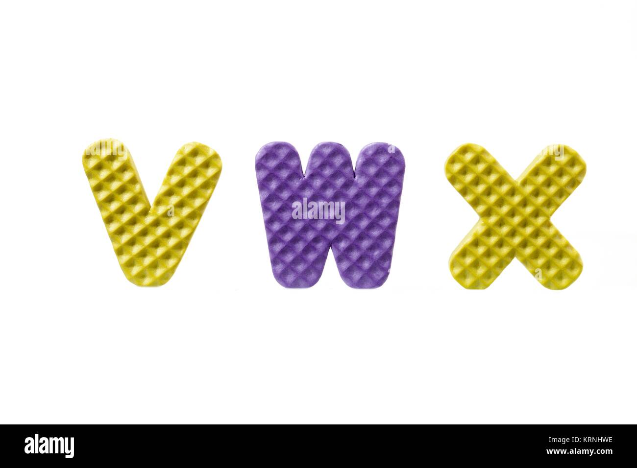 Alfabeto in gomma puzzle su una lettera vwx Foto Stock