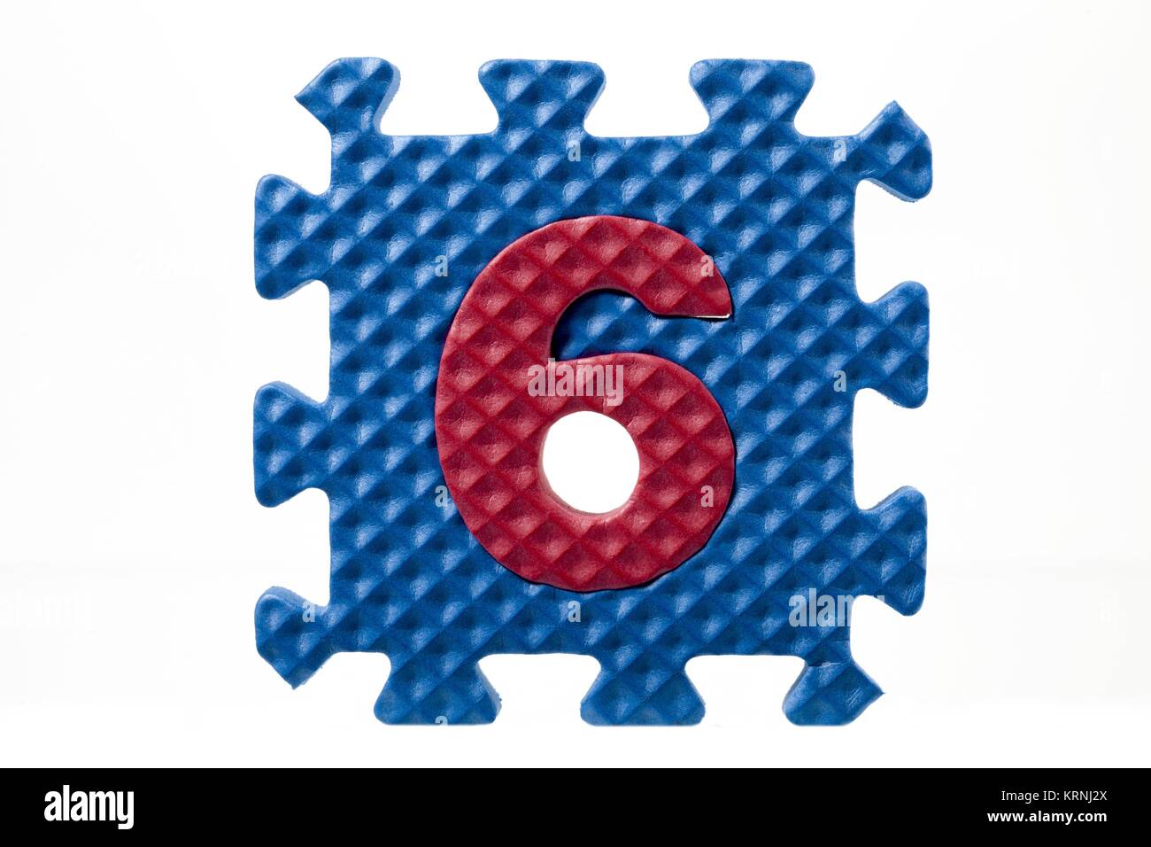 Puzzle di gomma con il numero sei Foto Stock