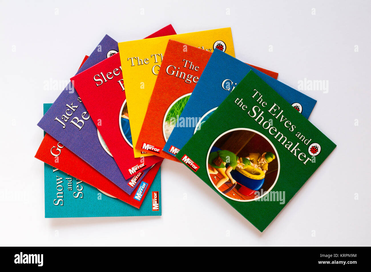 Selezione di Coccinella per bambini con dvd gli elfi e la bottega del calzolaio disco sulla parte superiore isolata su sfondo bianco Foto Stock