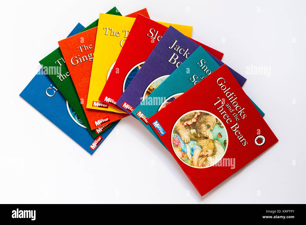 Selezione di Coccinella per bambini con dvd storia di Riccioli d'oro e i tre orsi disco sulla parte superiore isolata su sfondo bianco Foto Stock