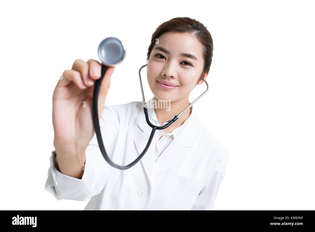 Giovani donne medico utilizzando uno stetoscopio Foto Stock