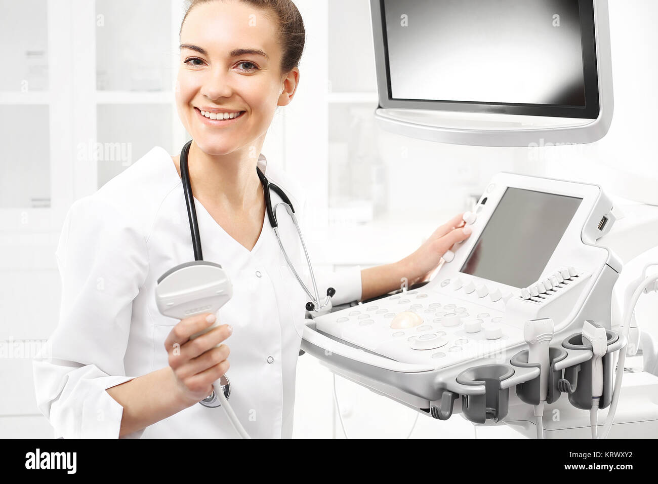 Sorridente medico,ultrasuoni Foto Stock