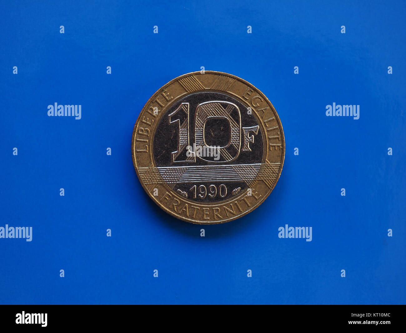 10 franchi coin, Francia su blu Foto Stock
