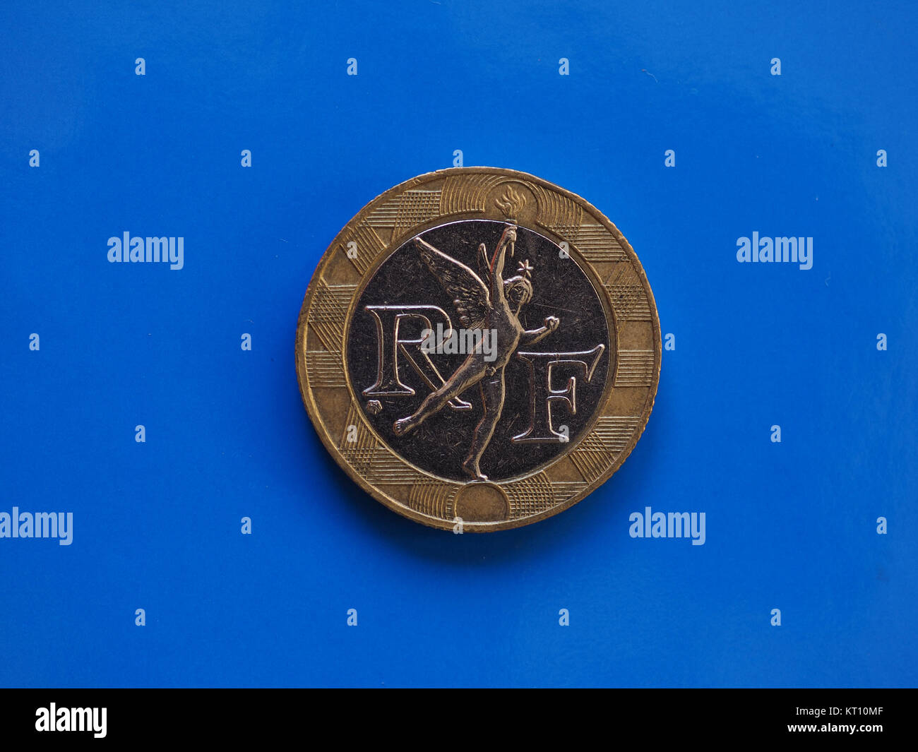 10 franchi coin, Francia su blu Foto Stock