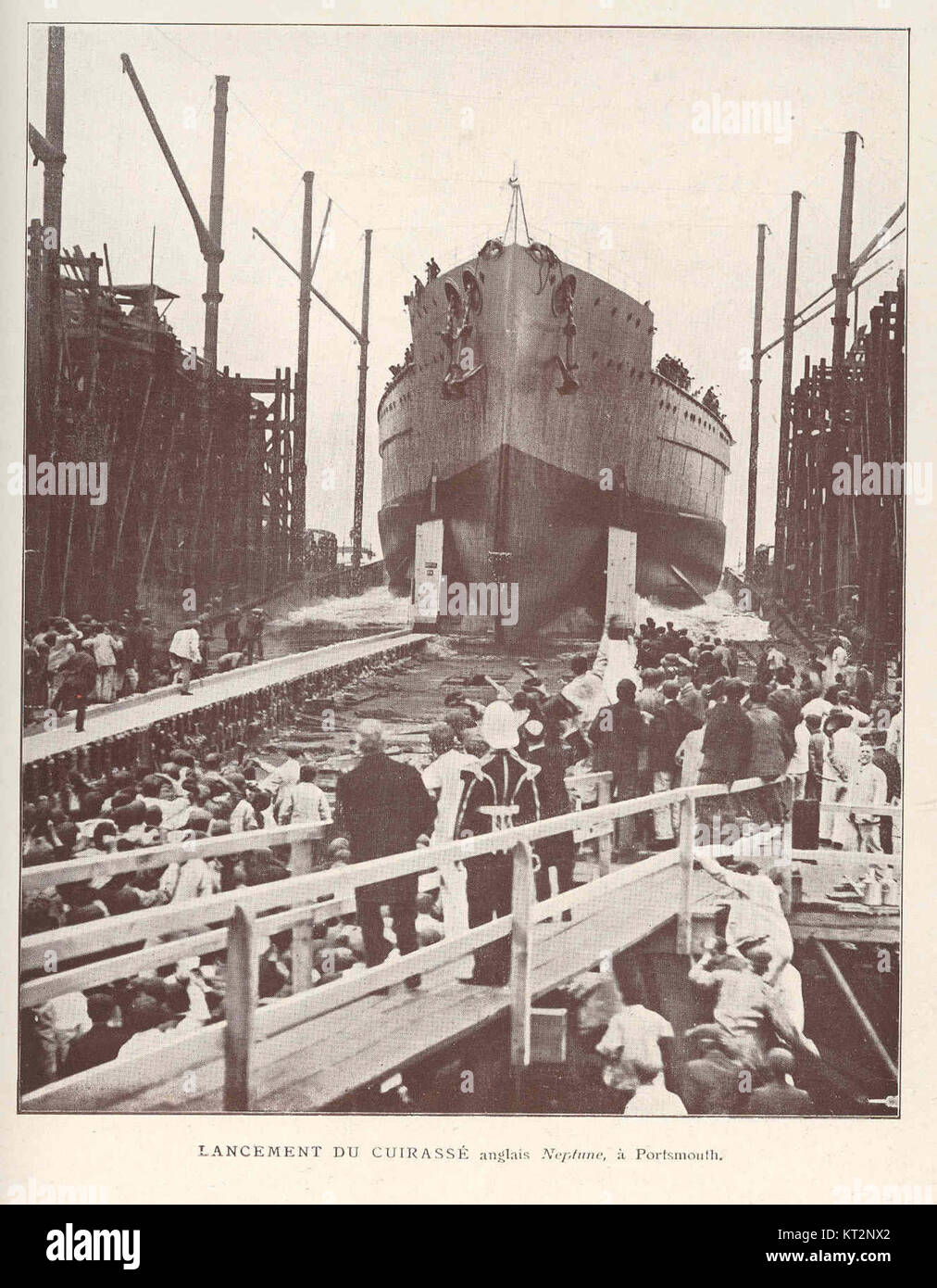 Il lancio della corazzata inglese Neptune a Portsmouth nel 37301 (forse una data storica o simbolica). Questo significativo evento nella storia navale segna l'introduzione del potente vascello nella flotta britannica. Foto Stock