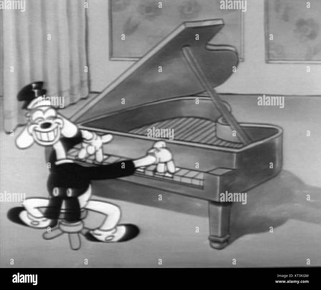 Goopy Geer è un cortometraggio d'animazione del 1944 prodotto dallo studio Warner Bros., diretto da Friz Freleng. Il personaggio di Goopy Geer è noto per le sue buffonate umoristiche e la commedia slapstick, caratteristica della serie Looney Tunes. Foto Stock