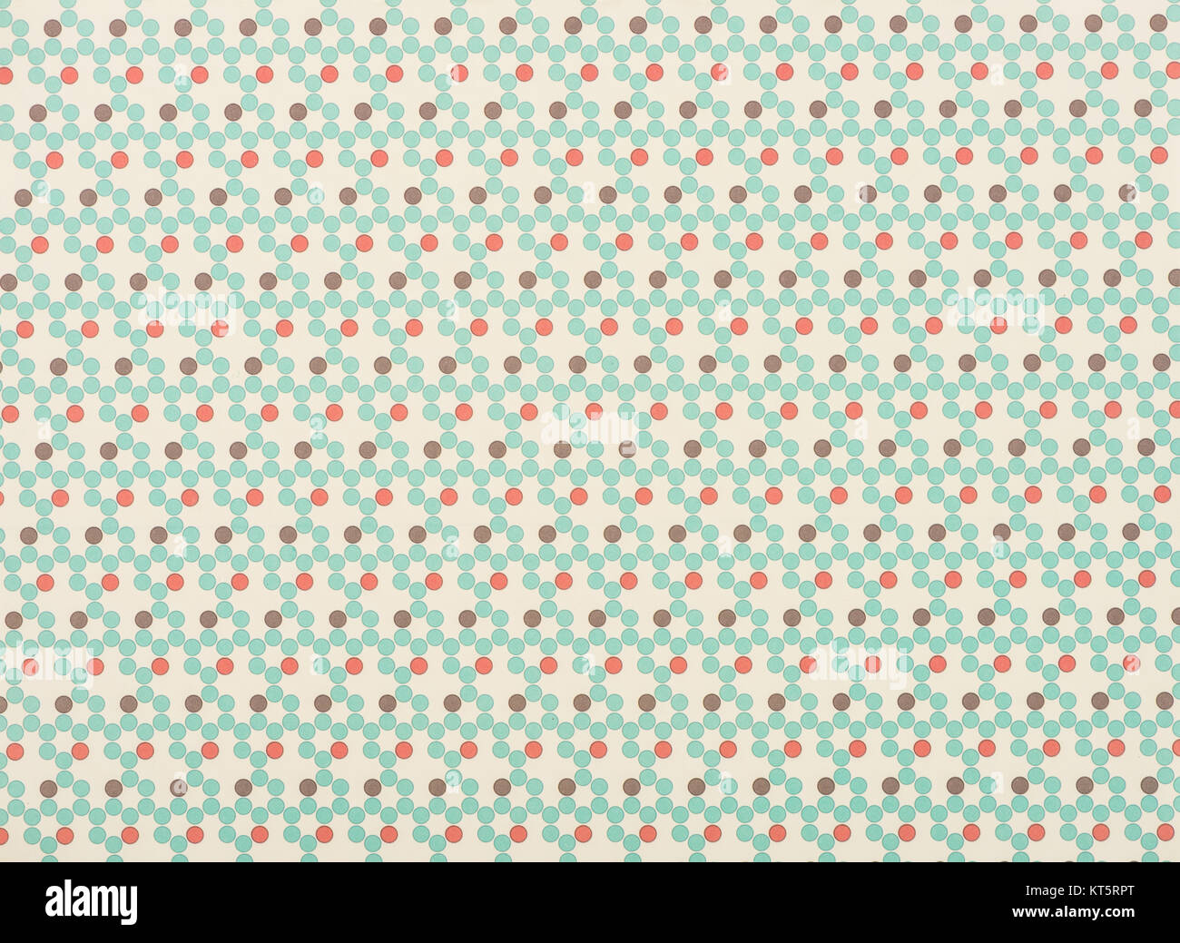 Rosso, marrone e turchese punti sul beige Foto Stock
