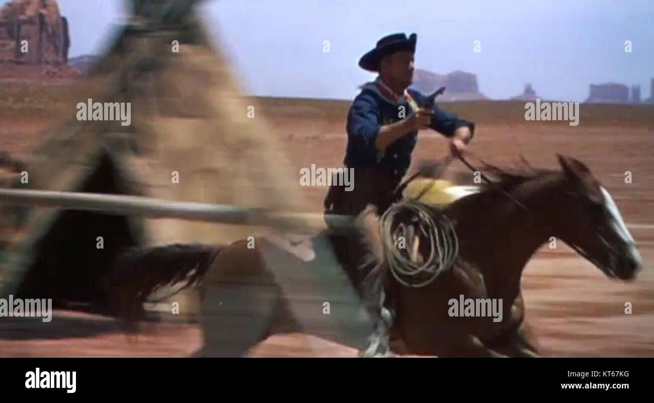 Lo screenshot del trailer di "Searchers" Ford è un'immagine del classico WESTERN del 1956 diretto da John Ford. Presenta elementi chiave del trailer, che sottolineano i temi della giustizia di frontiera e della famiglia. Foto Stock
