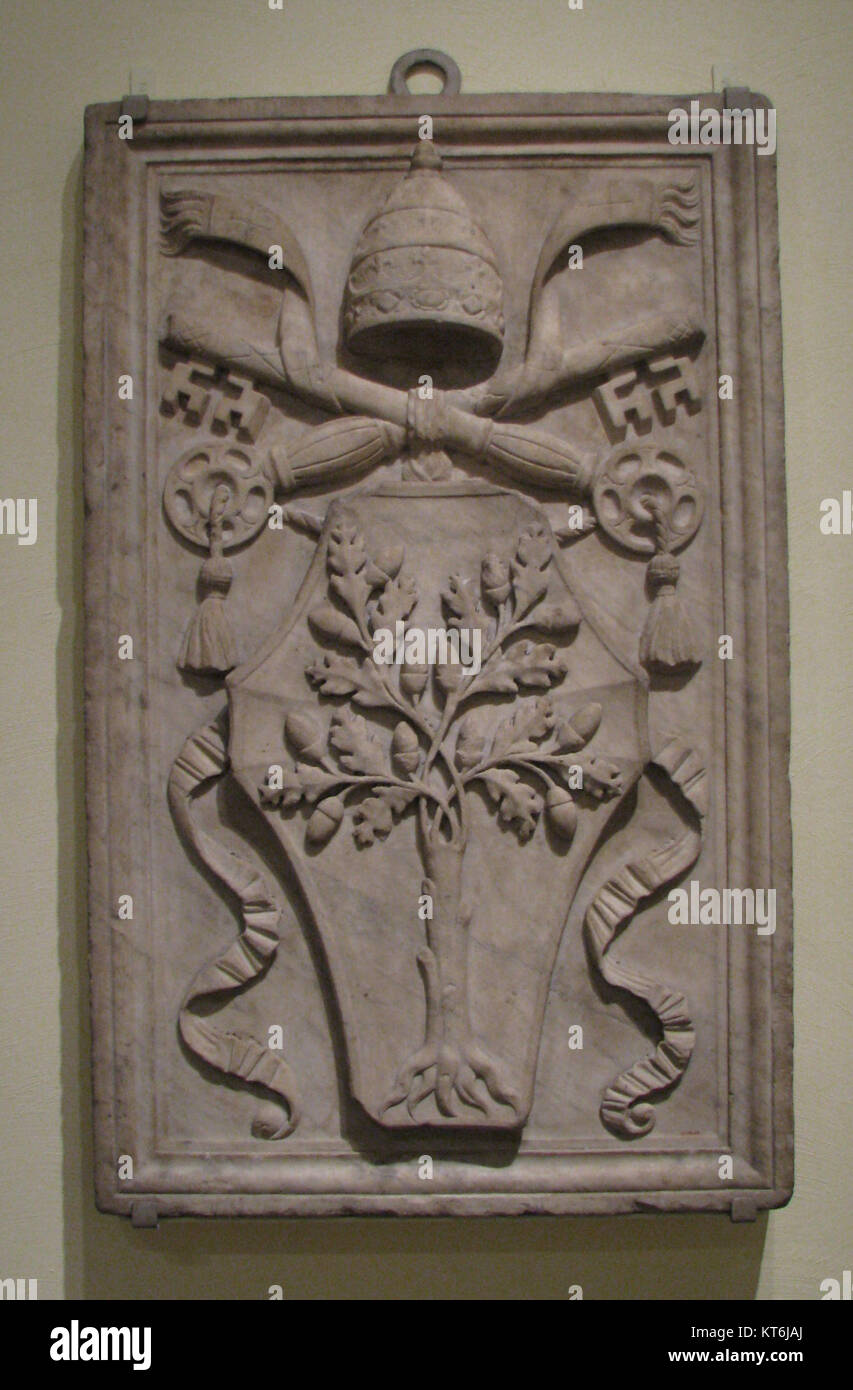 Le braccia di Papa Giulio II, con i simboli araldici associati a Giuliano della Rovere, che regnò come Papa dal 1503 al 1513. Il suo papato è ricordato per le principali commissioni artistiche e architettoniche, tra cui la messa in servizio del soffitto della Cappella Sistina di Michelangelo. Foto Stock