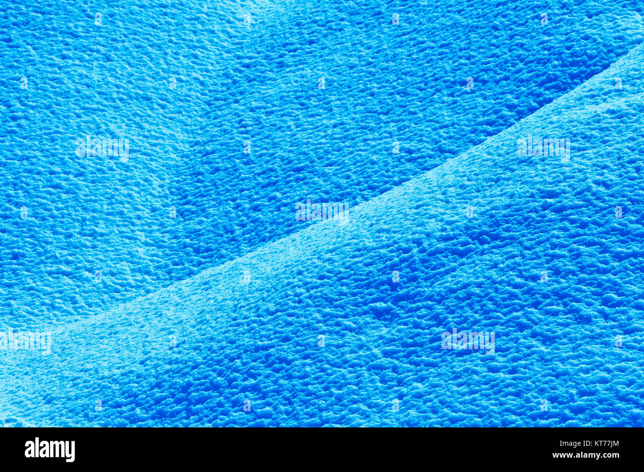 Ciano o colorate in blu testurizzato neve come superficie di sfondo Foto Stock