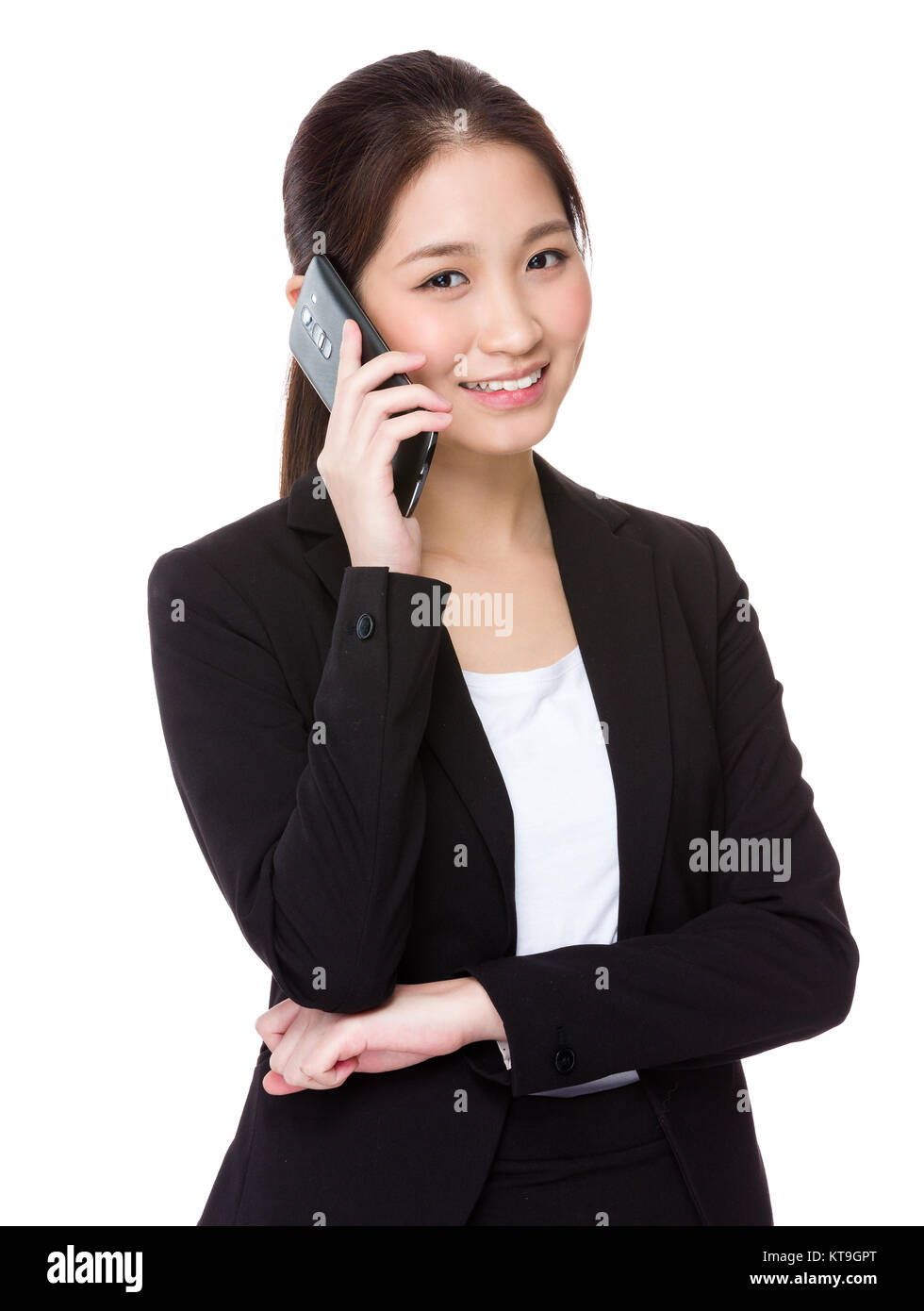 Asian imprenditrice parlare al cellulare Foto Stock