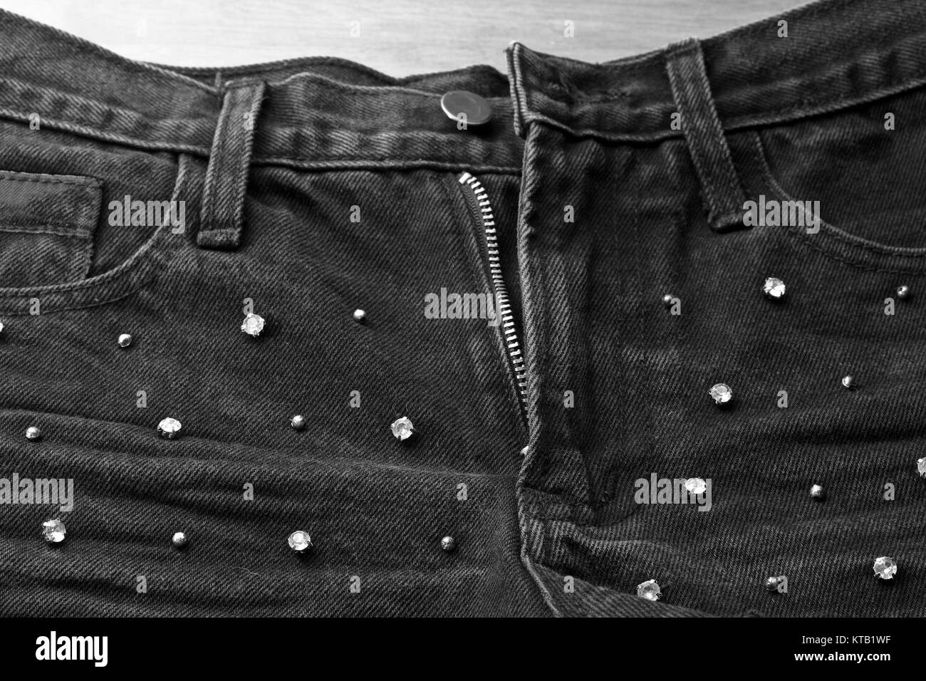 Jeans donna scatti fashion diamond dettaglio closeup bianco nero Foto Stock