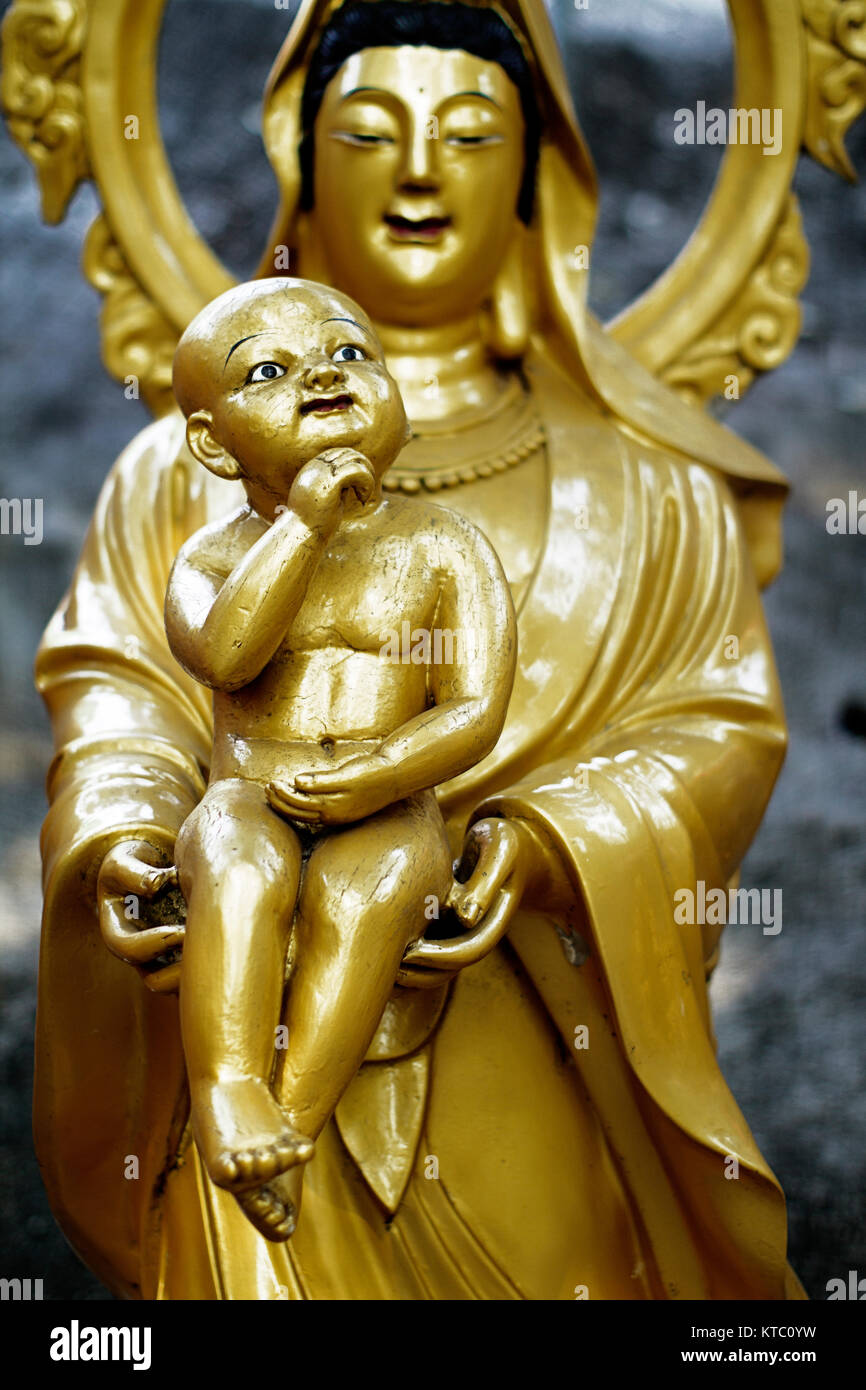 Golden sculture religiose di Hong Kong Foto Stock