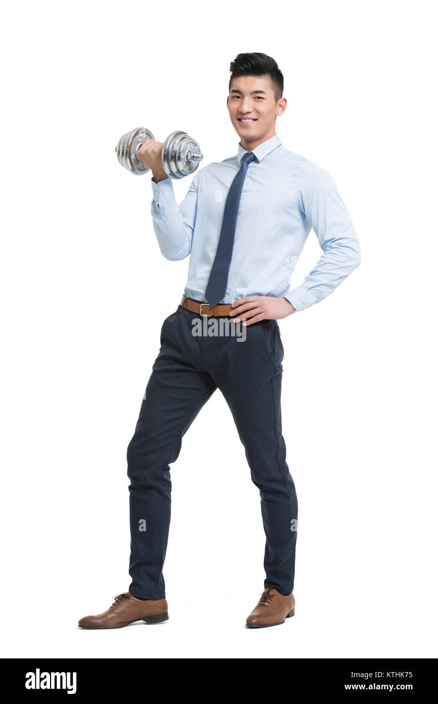Giovane imprenditore sollevamento pesi Foto Stock