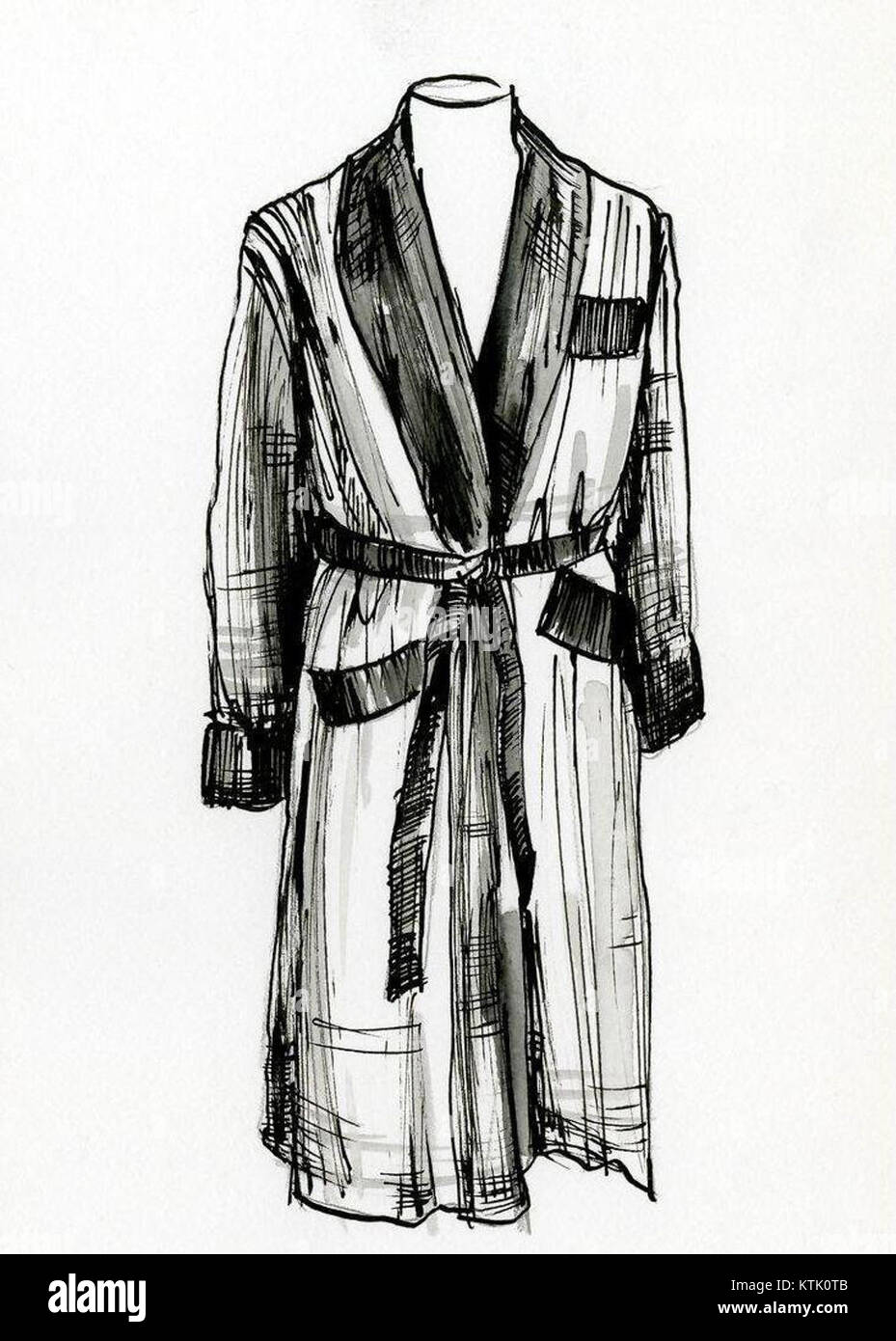 L'accappatoio è un indumento solitamente indossato dopo il bagno o la doccia. È progettato per offrire comfort e calore durante l'asciugatura, spesso realizzato con materiali assorbenti come cotone o spugna. Foto Stock