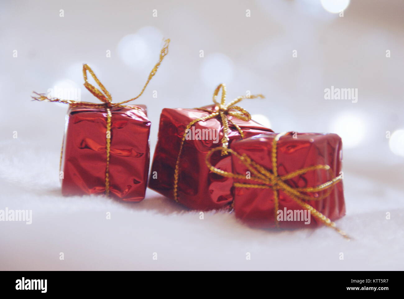 Tre avvolto regali di Natale Foto Stock