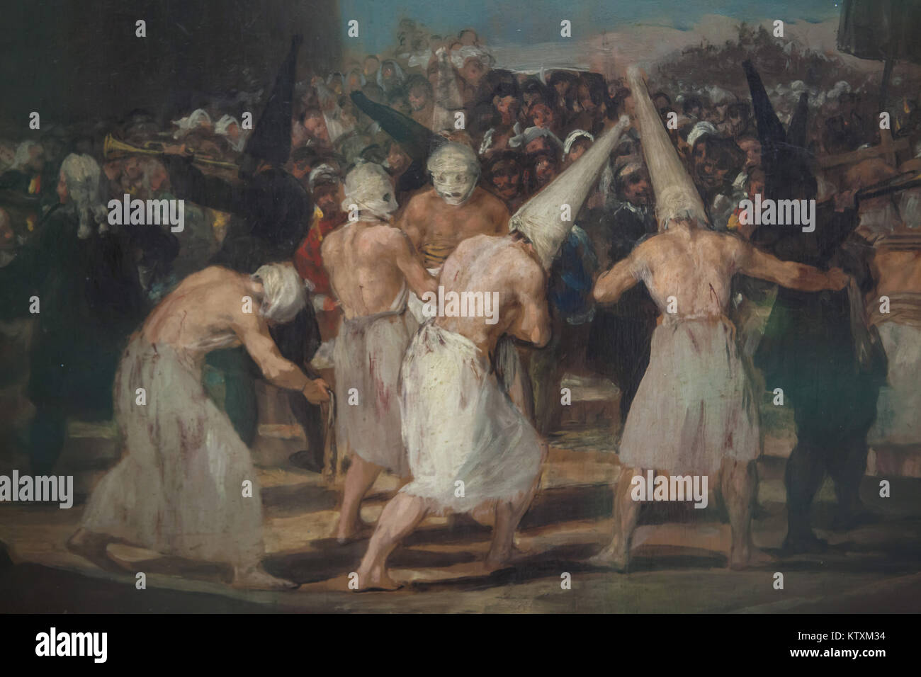 Flagellants illustrato nel dettaglio del dipinto "Processione di Flagellants' dal pittore spagnolo Francisco Goya (ca. 1814-1816) sul display in Real Academia de Bellas Artes de San Fernando (Reale Accademia di Belle Arti di San Fernando) a Madrid, Spagna. Foto Stock