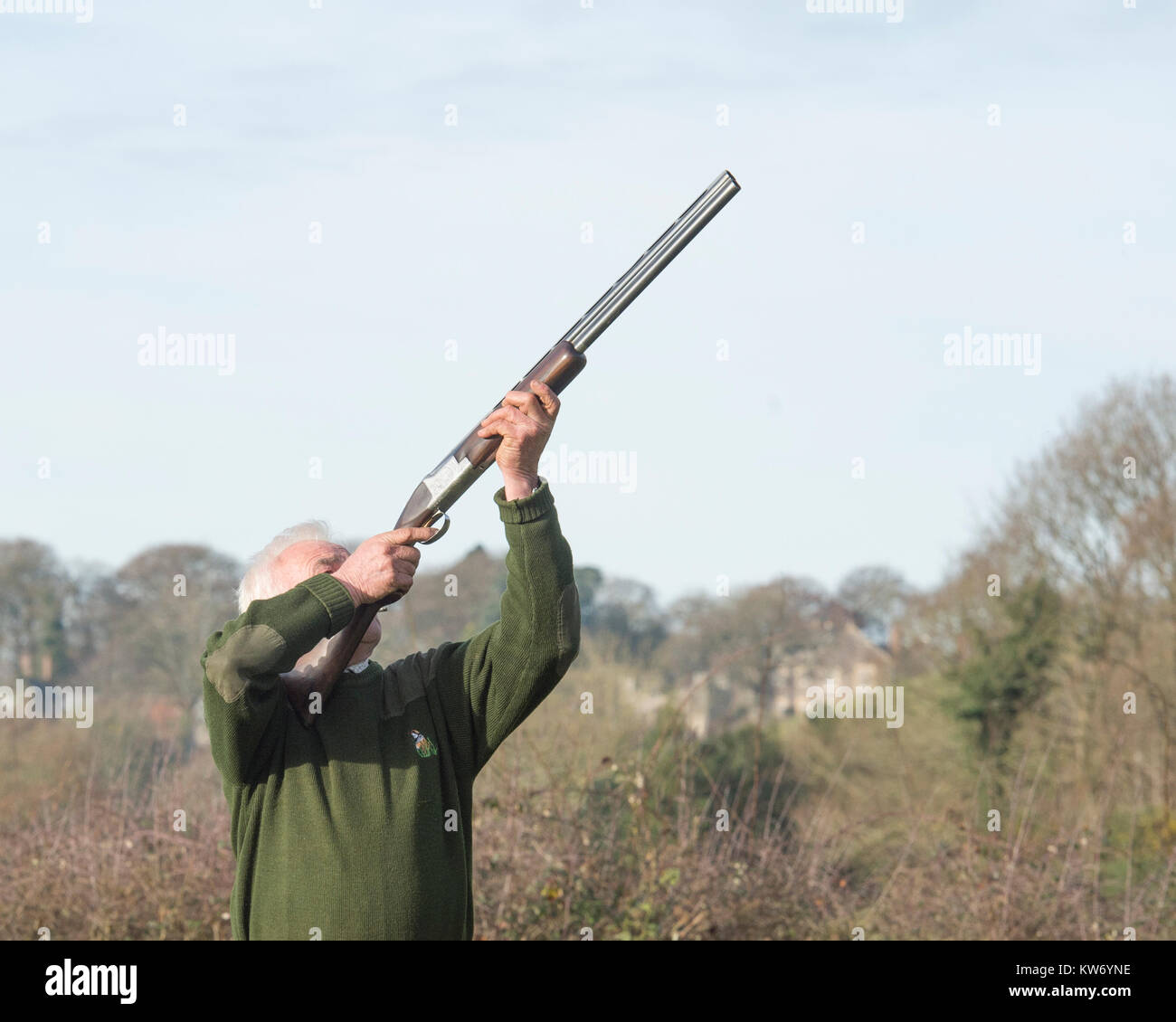 Uomo fagiani di ripresa Foto Stock