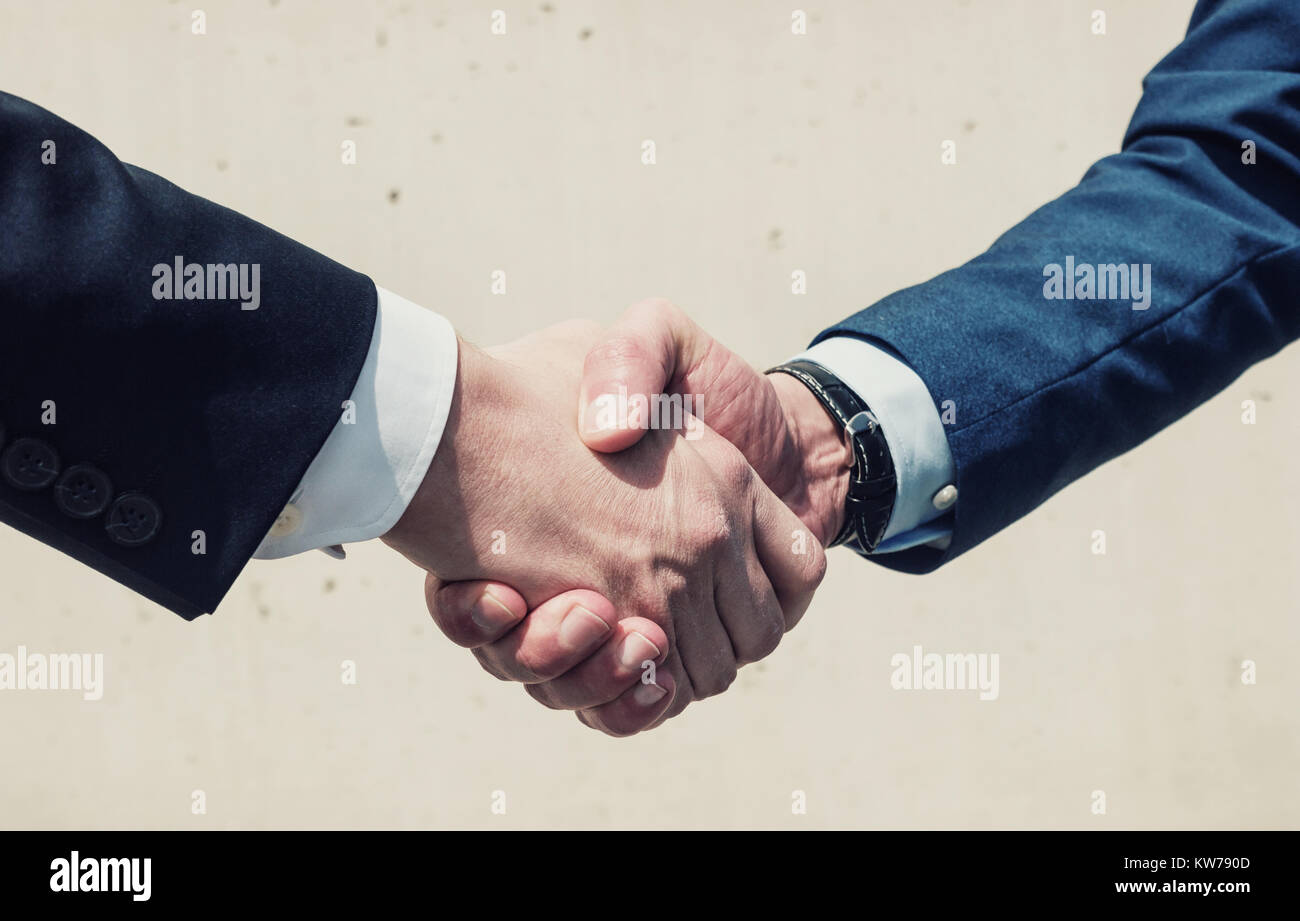 Handshake businessmans Foto Stock