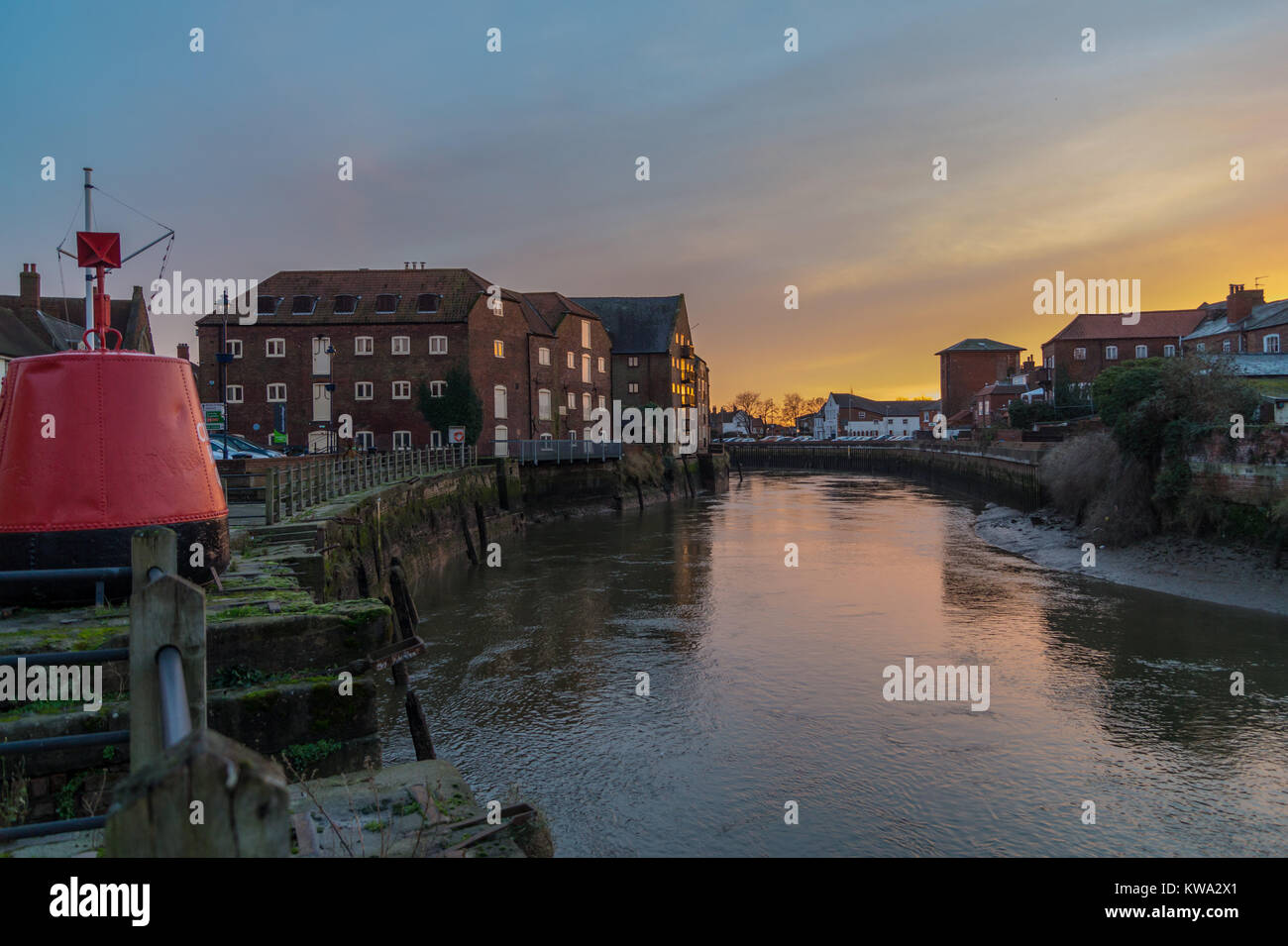 Estremità sud Quay, il Rifugio Fiume Witham, Boston, Lincolnshire, Inghilterra al tramonto Foto Stock