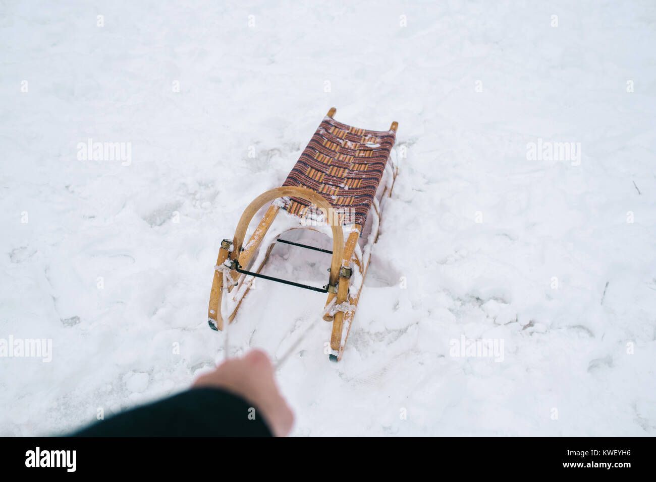 Dettaglio della mano della slitta di trazione. Prospettiva in prima persona. Foto Stock